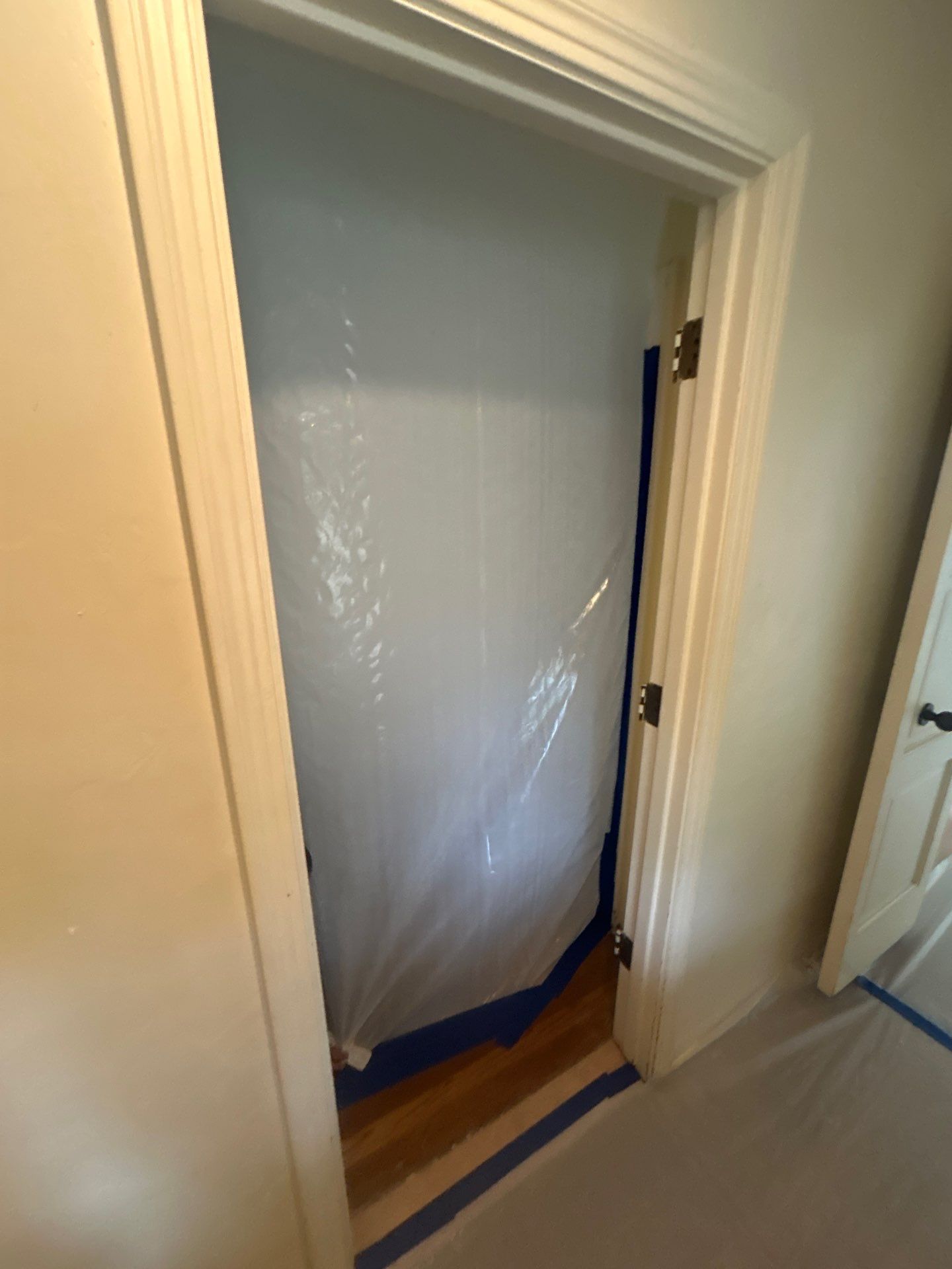 Interior doorway containment and floor protection at the Pismo Beach asbestos project